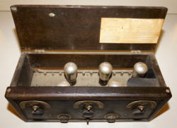 445E-3